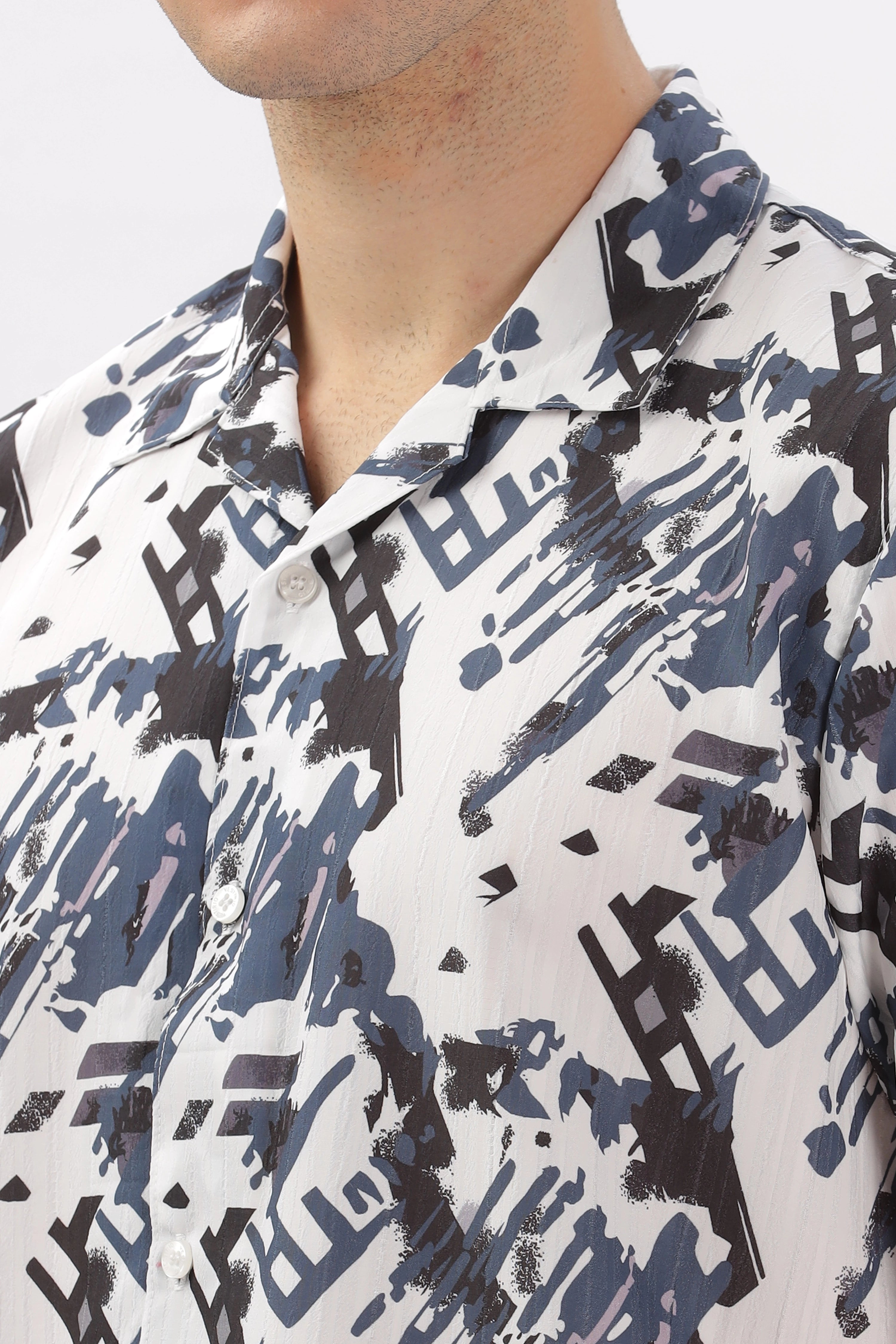 Black and blue abstract printed popcorn shirt